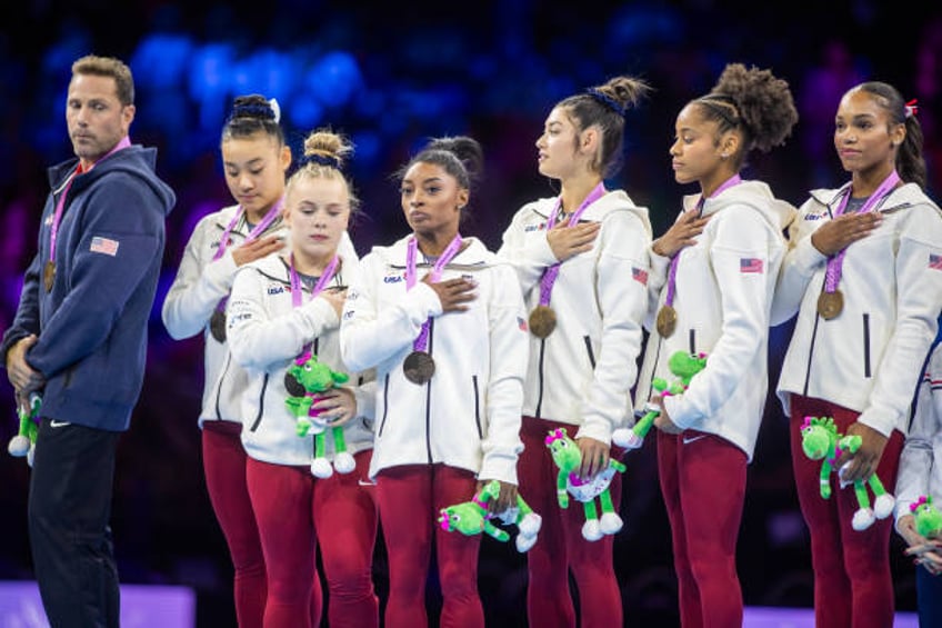 simone biles leads us women to record 7th straight team title at gymnastics world championships