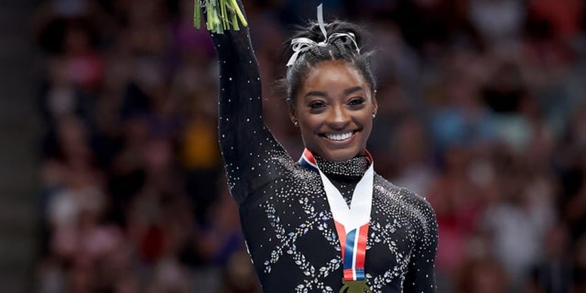 simone biles makes us gymnastics history by winning record 8th all around title