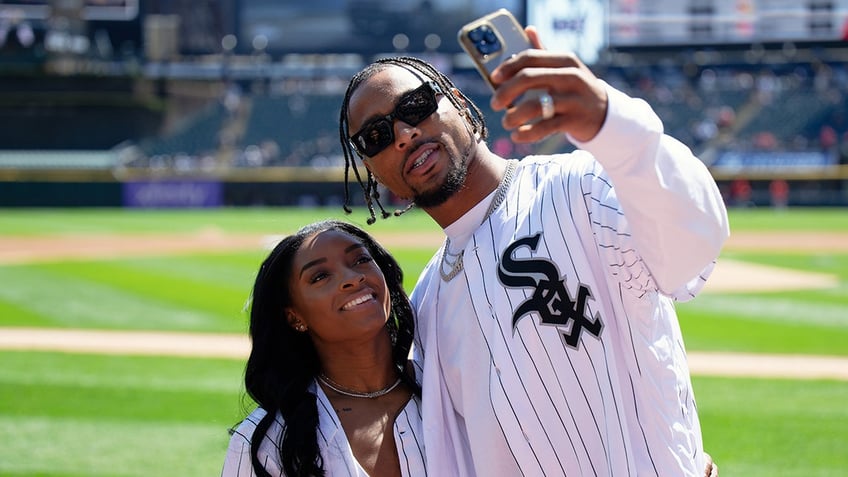 Simone Biles and Jonathan Owens at a White Sox game