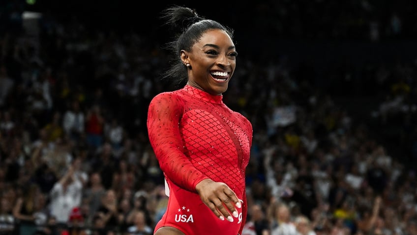 Simone Biles smiles