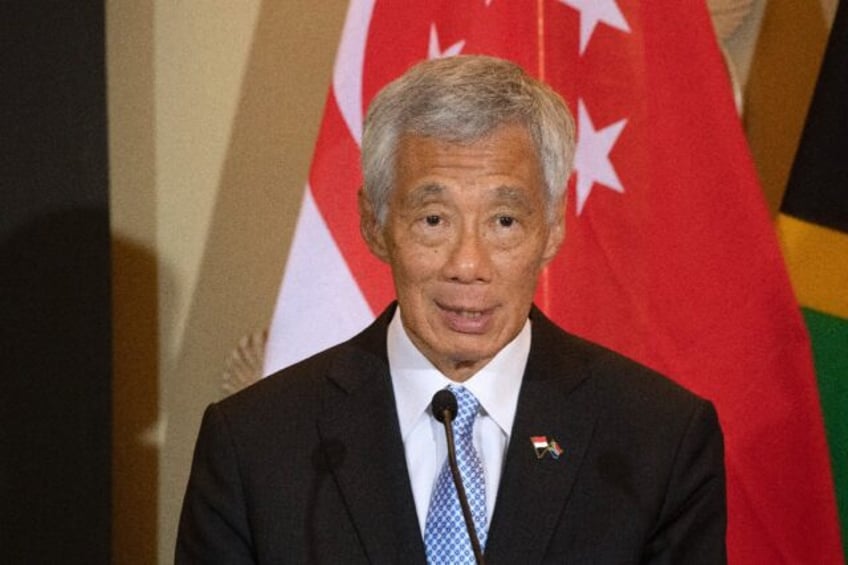 singapore pm says succession plan back on track