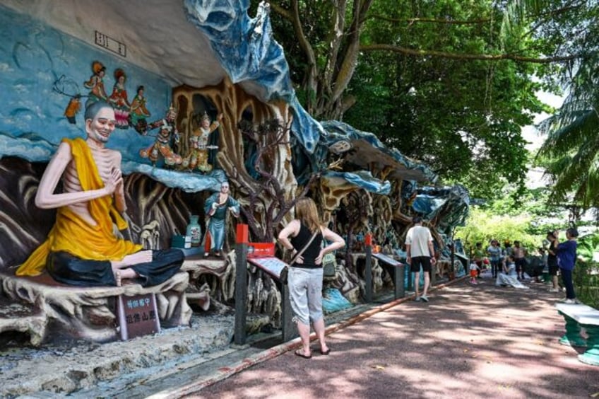 At Hell's Museum in Singapore, the main attraction at the Haw Par Villa park, visitors are