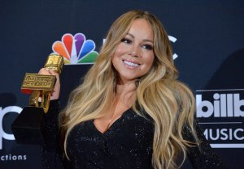 Singer Mariah Carey mourning deaths of mother, sister