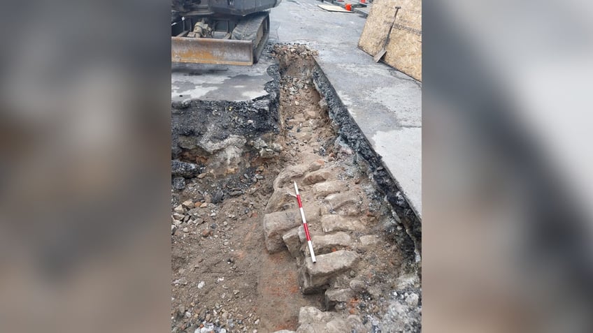 Horizontal photo of bricks beneath street