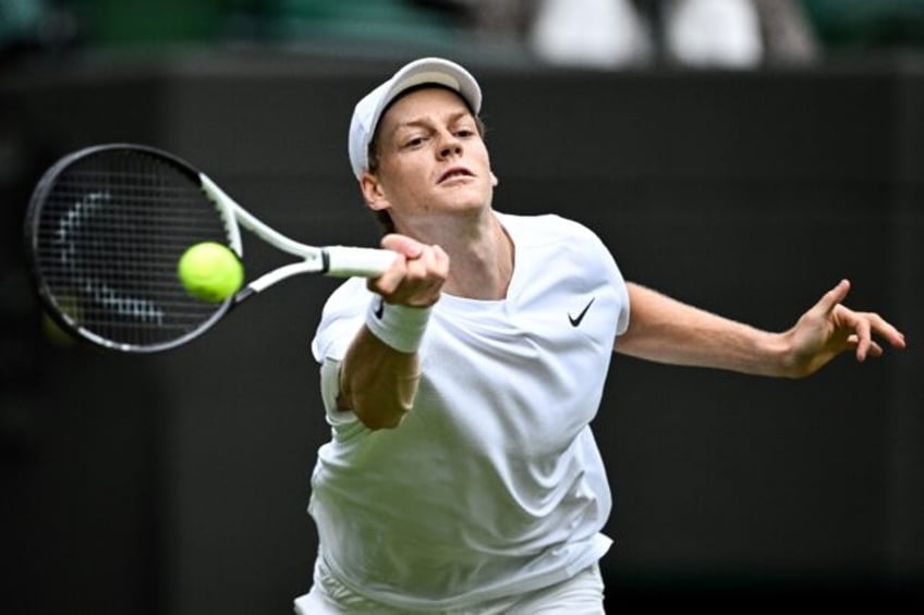 Jannik Sinner in first-round action against Yannick Hanfmann at Wimbledon