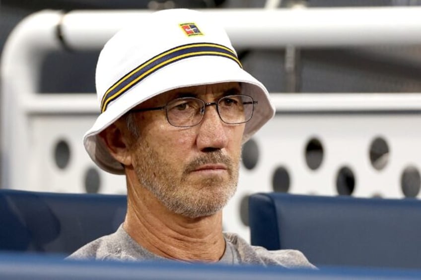 Coach Darren Cahill watches Jannik Sinner play Alexander Zverev during the semifinals of t