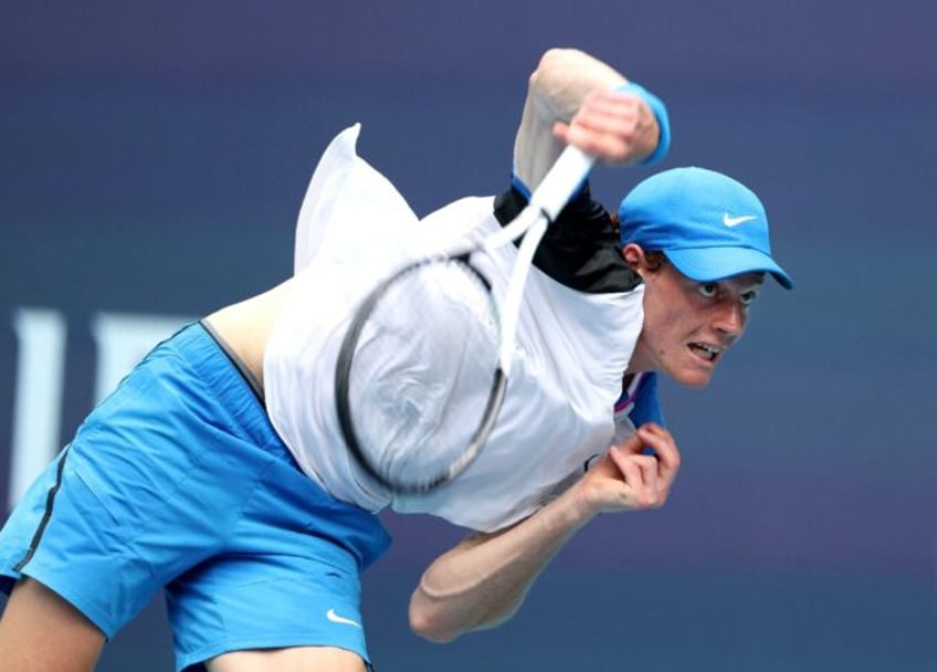 Jannik Sinner of Italy serves against Tomas Machac of the Czech Republic during their Miam