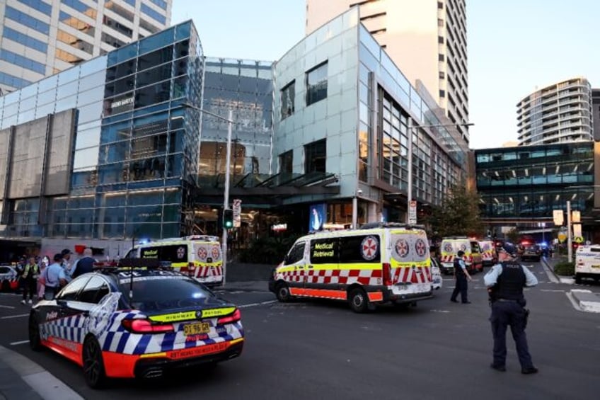 Police cordon off the Westfield Bondi Junction shopping mall in Sydney after a stabbling i