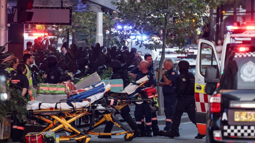 six reported dead in australian stabbing spree at busy shopping center police