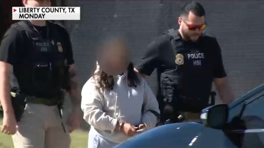 Illegal alien being walked to the unit after being arrested.