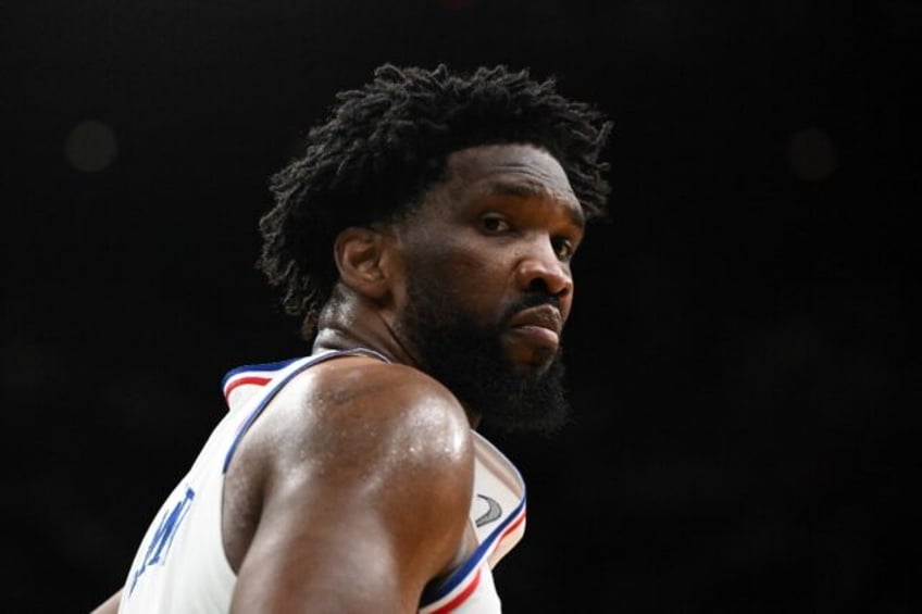 Philadelphia center Joel Embiid looks at the bench during the fourth quarter of the 76ers'