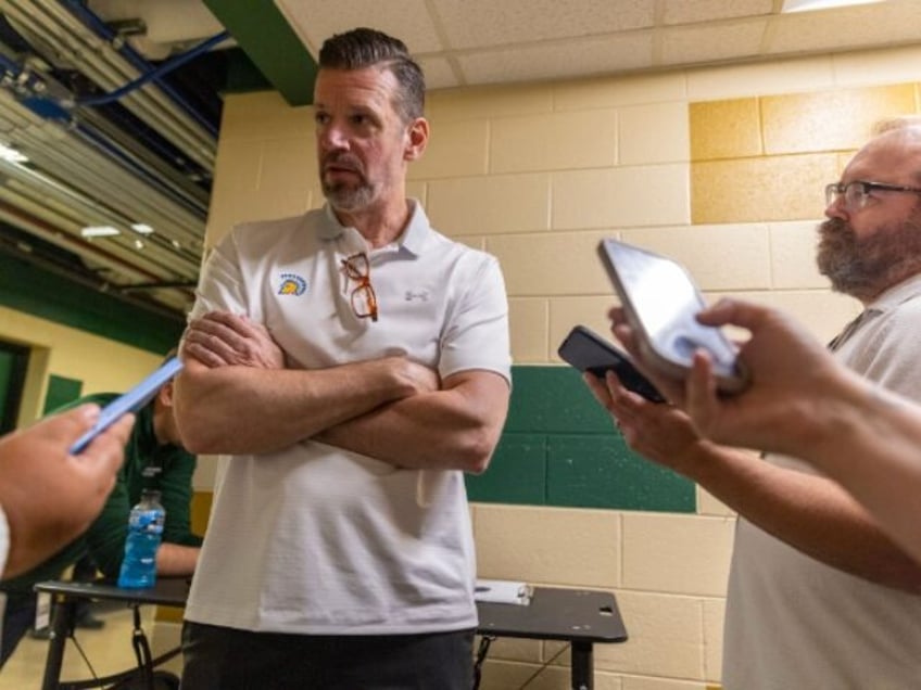 San Jose State University Spartans head coach Todd Kress speaks with members of the news m