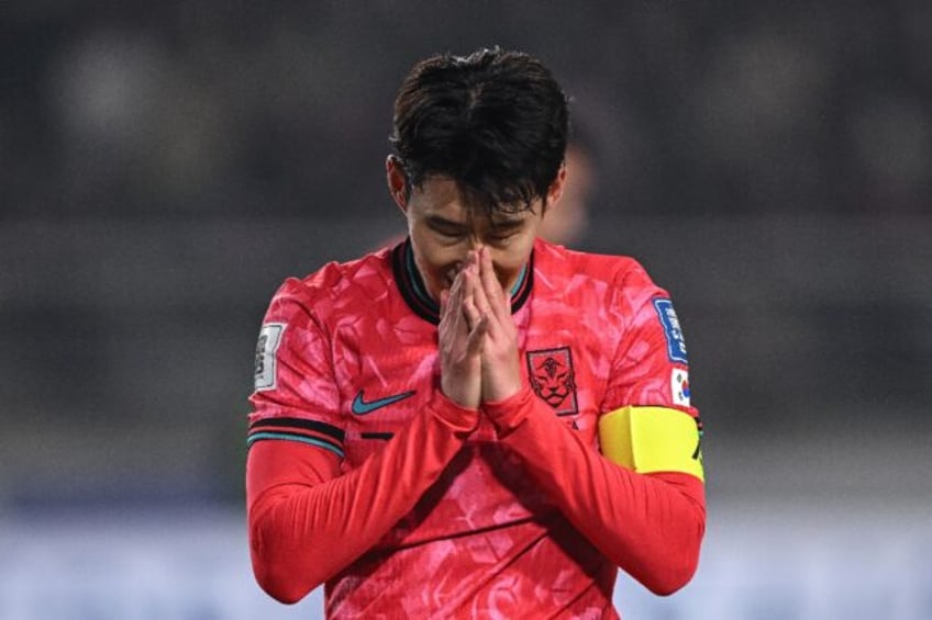 Son Heung-min reacts to a missed chance against Oman in World Cup qualifying