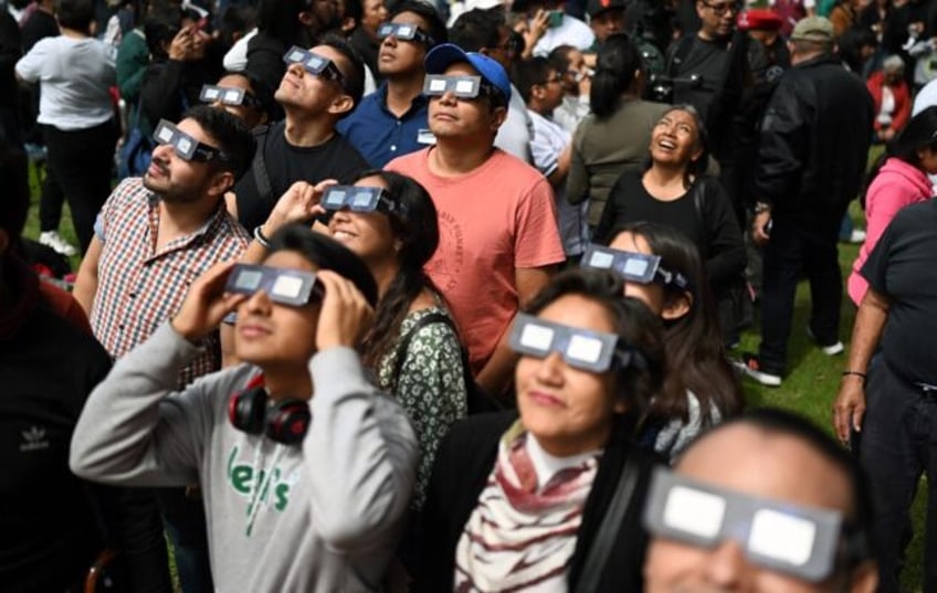 skygazers watch ring of fire eclipse over western hemisphere