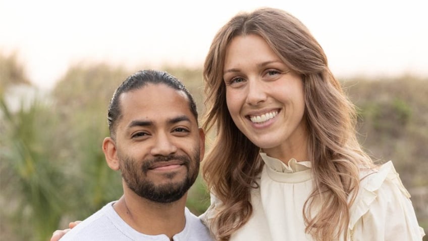 Mario Fernandez and Shanna Gardner-Fernandez pose together.