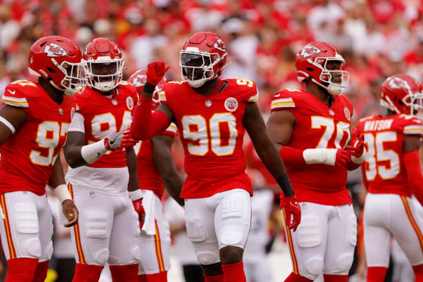 Charles Omenihu of the Kansas City Chiefs adjusts the team's defensive formation during the first quarter in a preseason game against the Cleveland...