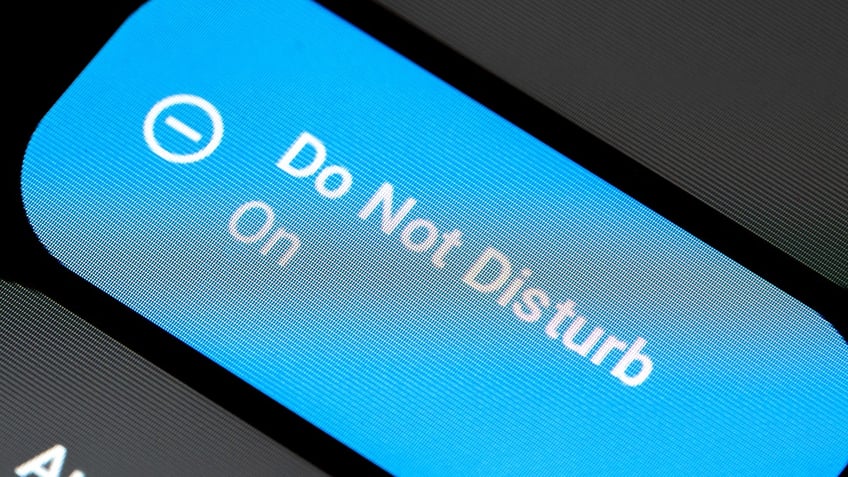 Close-up of a smartphone device screen showing the Do not Disturb mode being enabled