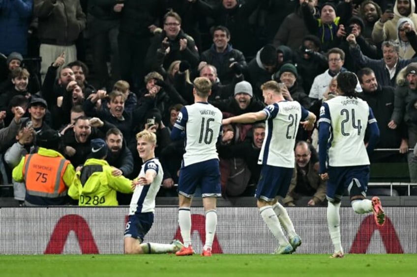 Tottenham's Lucas Bergvall (L) celebrates after scoring against Liverpool