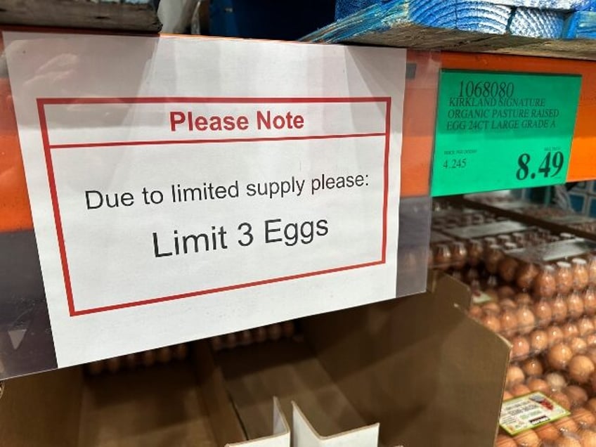 A sign notes the limitation on the purchase of flats of eggs in a Costco warehouse Tuesday