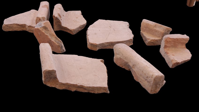 small fragments of ancient roof tiles found in the city of david provide evidence of jerusalems history