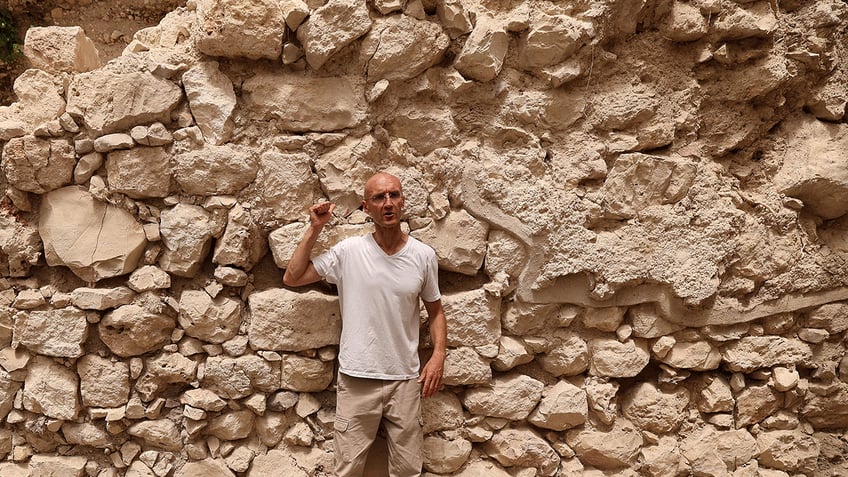 small fragments of ancient roof tiles found in the city of david provide evidence of jerusalems history