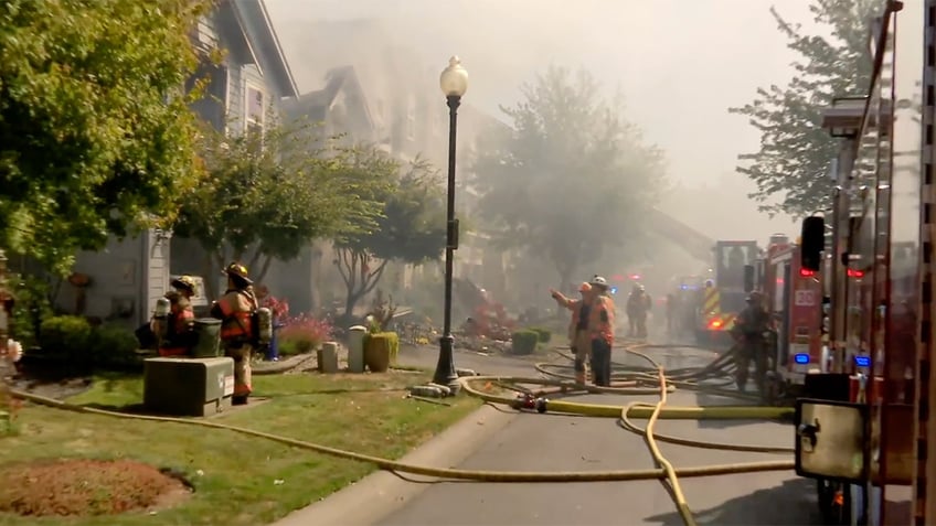 firefighters at scene of plane crash