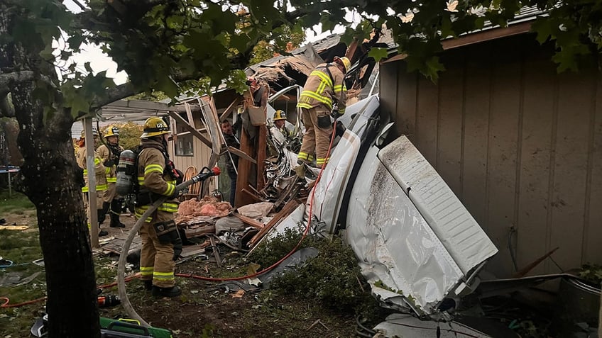 small planes crashes through oregon home killing 2 on board