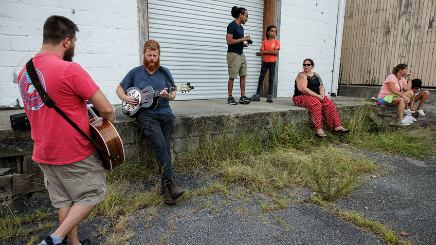 small town back in the spotlight after raging success of rural rich men anthem we look out for each other