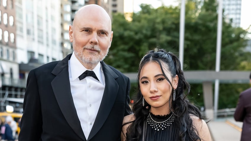 Billy Corgan and Chloe Mendel attend a fashion event