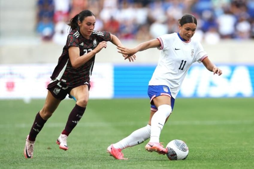 Sophia Smith (right) scored the only goal in the USA's 1-0 Olympic warm-up victory over Me