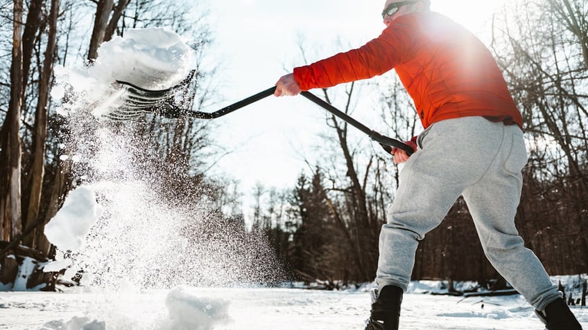 Man shoveling snow