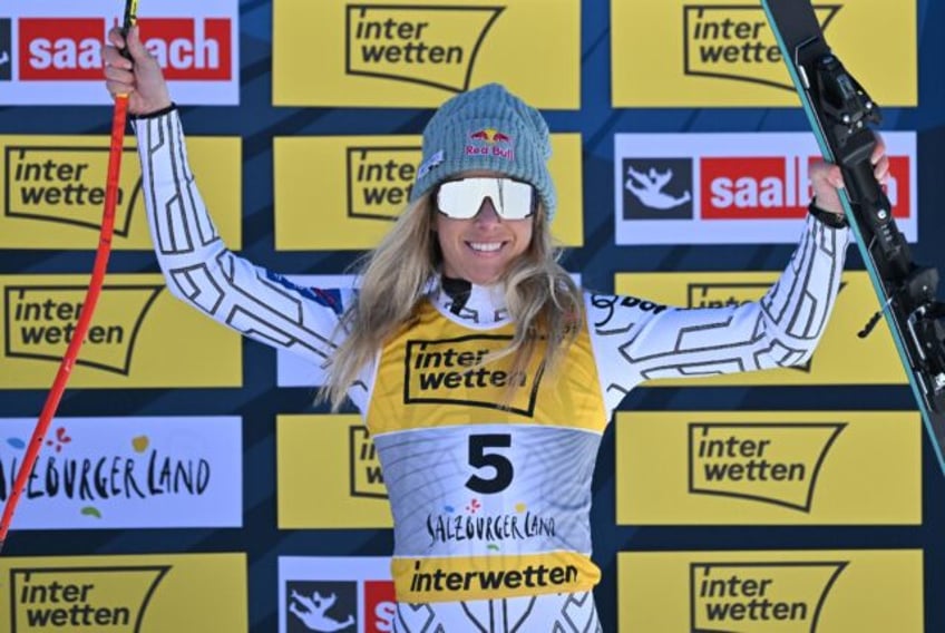 Czech Republic's Ester Ledecka celebrates after her bronze-medal showing in the downhill i