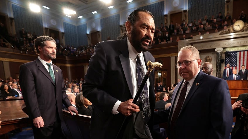 WASHINGTON, DC - MARCH 04: U.S. Rep. Al Green (D-TX) is removed from the chamber as President Donald Trump addresses a joint session of Congress at the U.S. Capitol on March 04, 2025 in Washington, DC.  