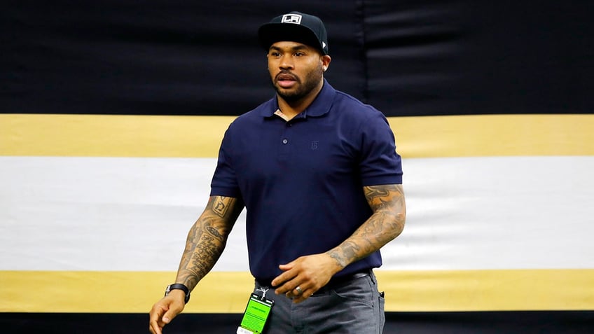 Steve Smith walks onto the field