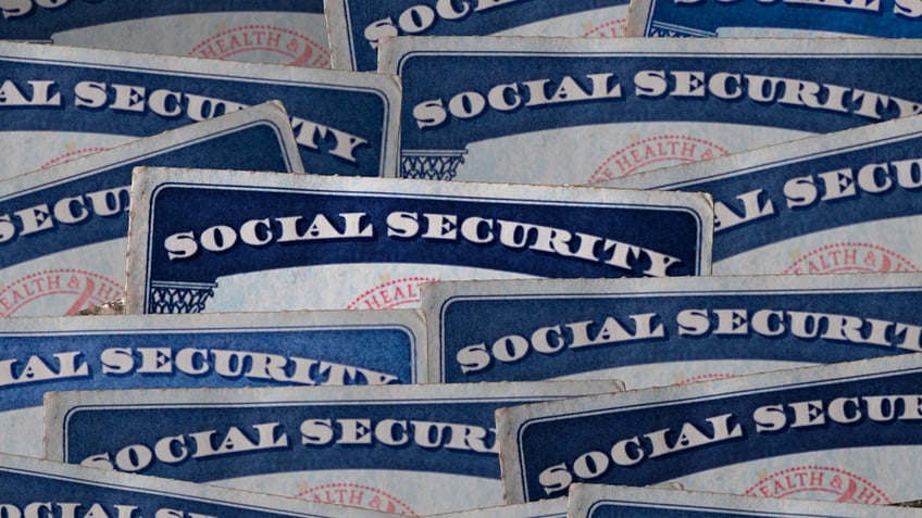 Social Security cards are pictured.