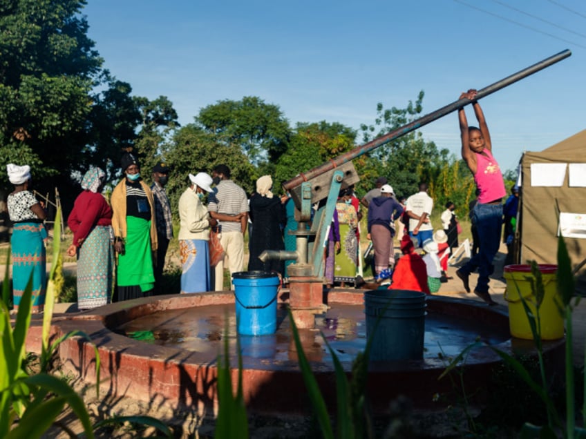 socialist zimbabwe limits funerals and bans handshakes in cholera lockdown