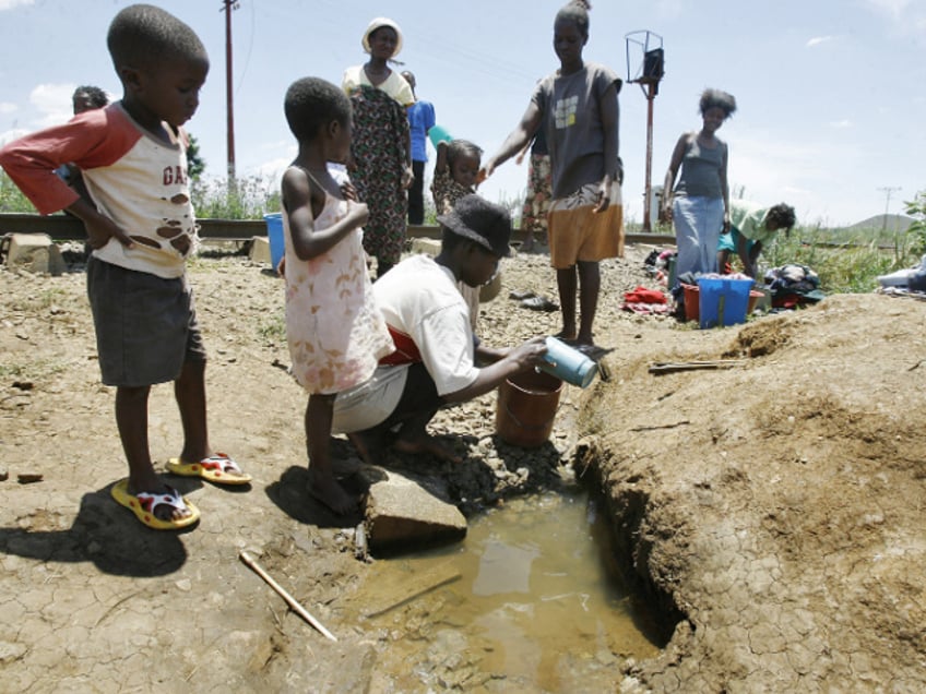 socialist zimbabwe limits funerals and bans handshakes in cholera lockdown