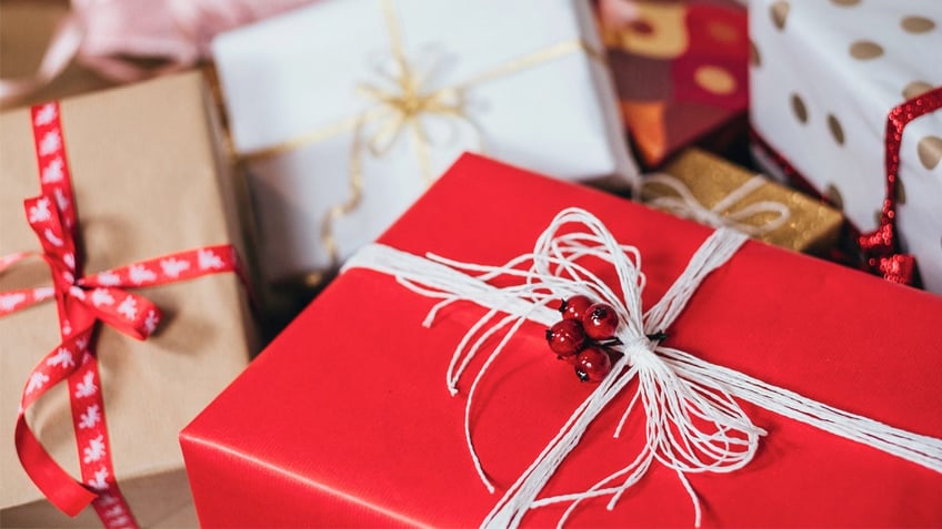 some americans forced to forgo christmas gifts due to inflation survey