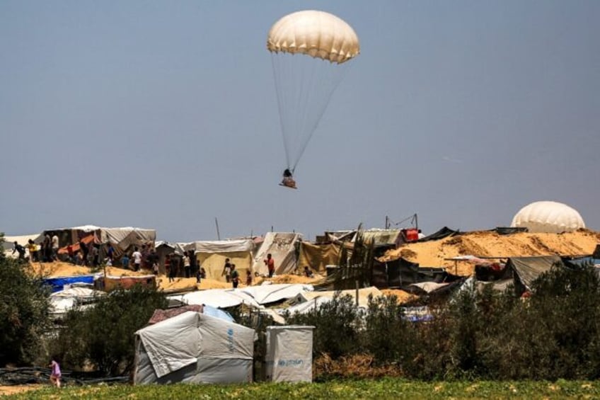 Humanitarian aid dropped on Khan Yunis falls near tents sheltering Palestinians displaced