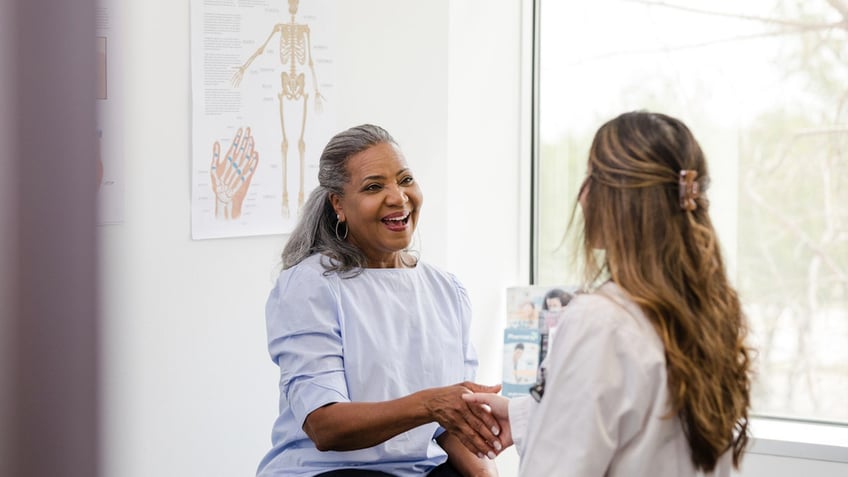 Female doctor and patient