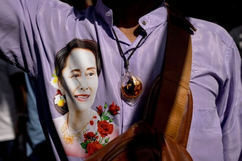 File image of a Burmese protester wearing a shirt depicting detained Myanmar civilian lead