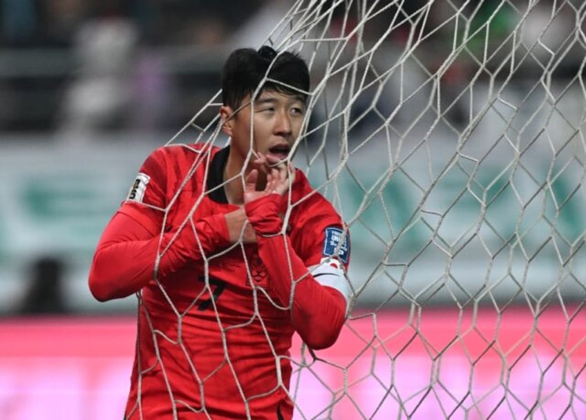 son scores twice as s korea outclass china in world cup qualifier