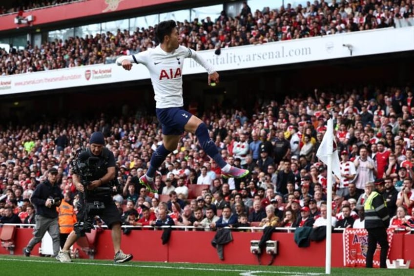 son shines as spurs rescue derby draw at arsenal