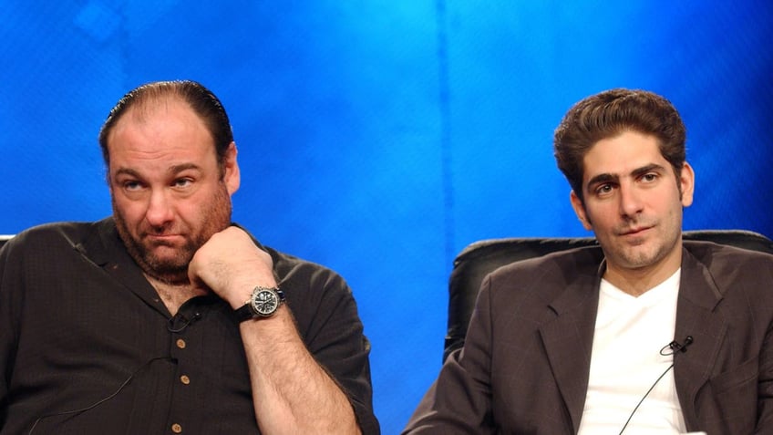 James Gandolfini and Michael Imperioli sitting side by side.