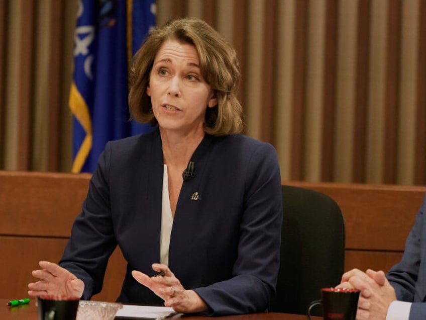 Wisconsin Supreme Court candidates Brad Schimel and Susan Crawford participate in a debate