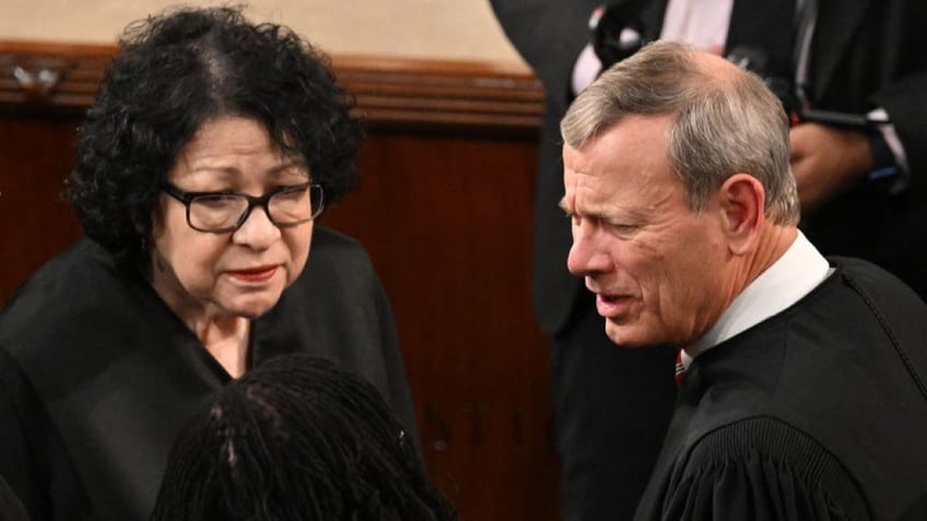 (L-R) US Supreme Court Chief Justice John Roberts and US Supreme Court Associate Justice Sonia Sotomayor look on prior to US President Joe Biden's State of the Union address in the House Chamber of the US Capitol in Washington, DC, on March 7, 2024. (Photo by Mandel NGAN / AFP) (Photo by MANDEL NGAN/AFP via Getty Images)