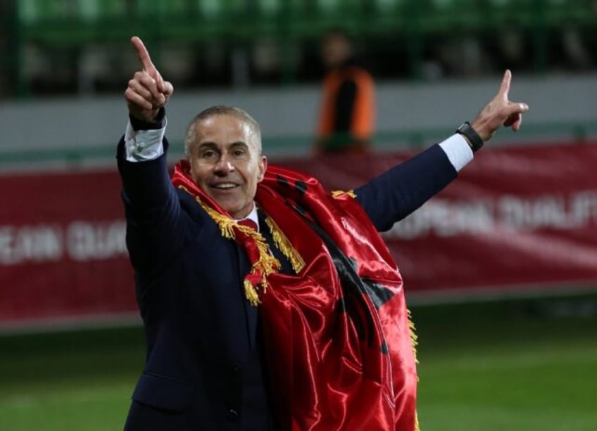 Sylvinho celebrates after Albania qualified for Euro 2024