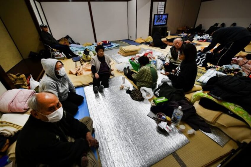 Evacuees rest at a shelter in Nanao after a major earthquake struck central Japan on New Year's Day