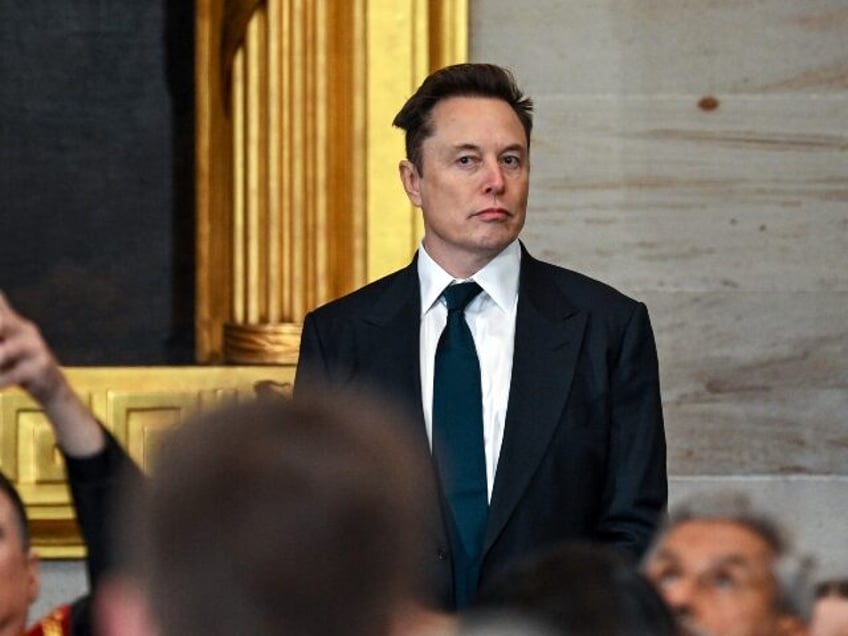 Elon Musk with a dour look on his face