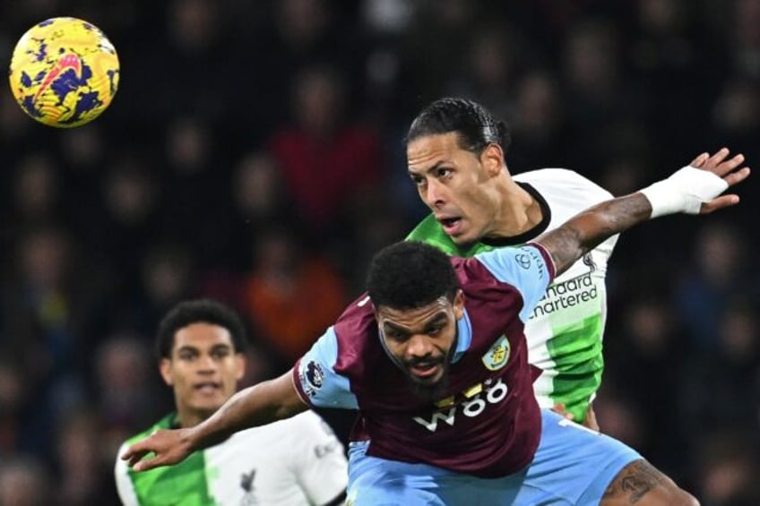 South Africa-born Burnley forward Lyle Foster (C) in a goalmouth tussle against Liverpool on December 26, 2023.